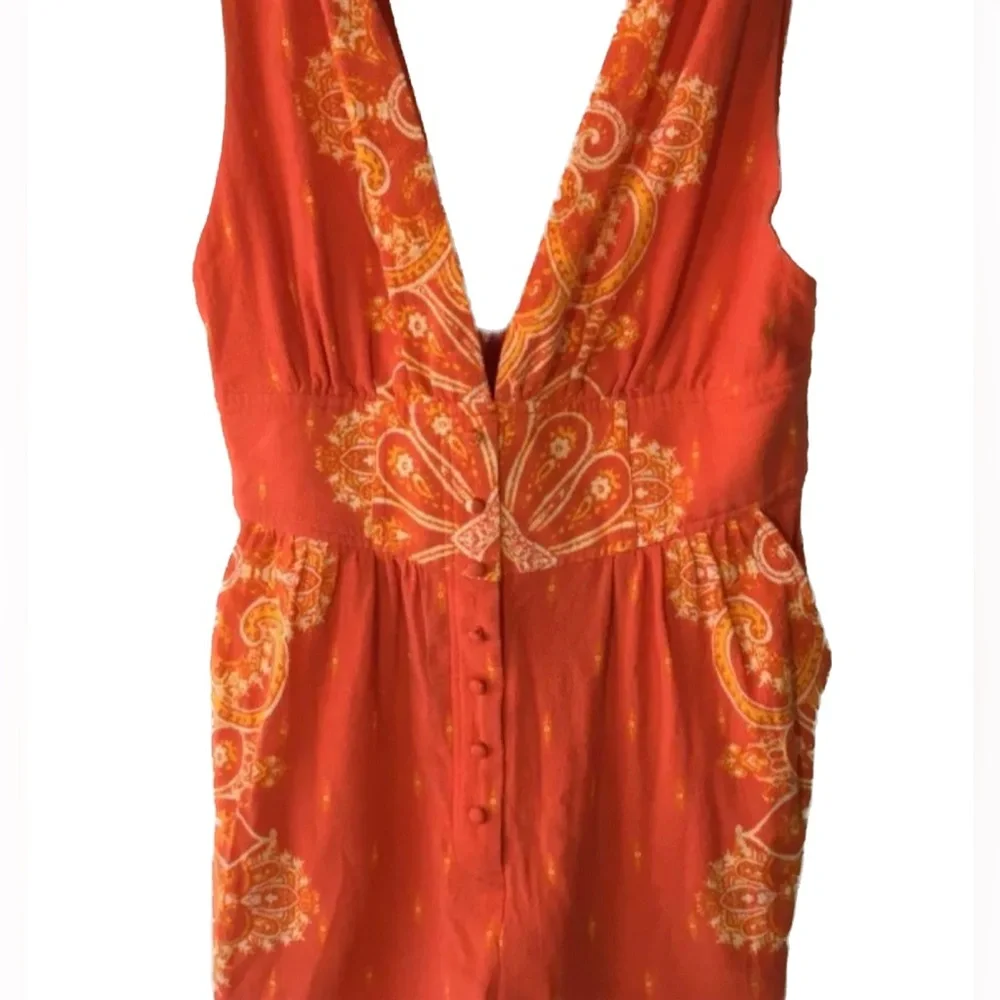 Free People’s Setting Sun Printed Orange Cropped Jumpsuit NWOT - Picture 4 of 12